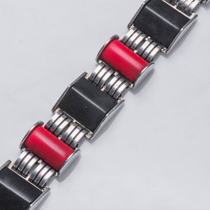 null Bracelet articulé en métal orné d'éléments cylindriques recouvert de résine...
