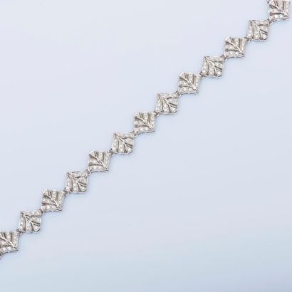 null Bracelet articulé en or gris 18 carats (750 millièmes) composé de maillons en...