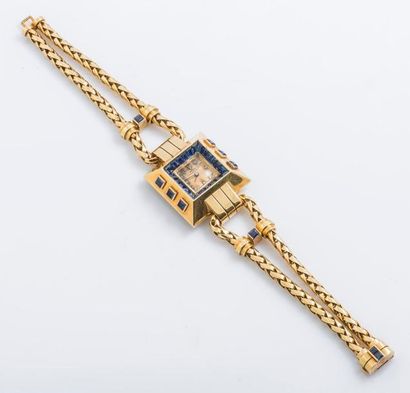T. GARNIER vers 1940 Montre bracelet en or jaune 18 carats (750 millièmes), le boîtier...