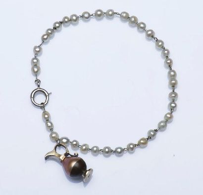null Bracelet en argent (925 millièmes) composé de petites perles de culture grises...