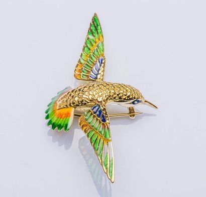 null Broche en or jaune 18 carats (750 millièmes) en forme de colibri émaillé bleu,...