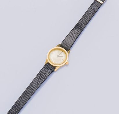 BAUME ET MERCIER (Montre de dame en or jaune), vers 1960

Montre ronde de taille...