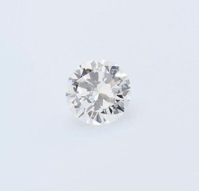 null Un diamant taillé en brillant pesant 5,11 carats de couleur E et pureté VVS1,...