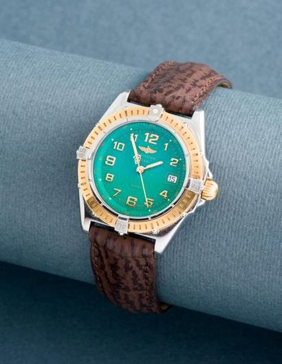 BREITLING (LADY WINGS - GREEN RÉF. D 67050), vers 2000

Montre de femme en acier...