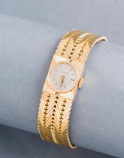 LONGINES LONGINES (MONTRE GOURMETTE – OR JAUNE), vers 1958

Bracelet montre de femme...