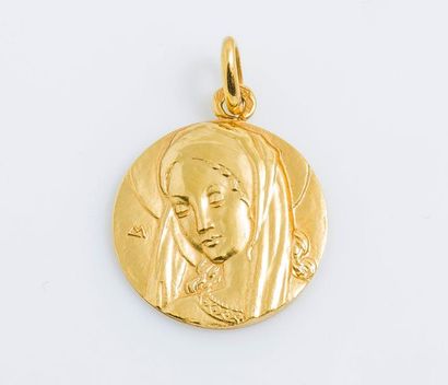 null Médaille en or jaune 18 carats (750 millièmes) représentant la Vierge.

Diam...