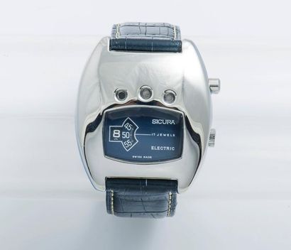 SICURA (INSTALITE ELECTRIC), vers 1974 

Originale montre design en forme de casque...