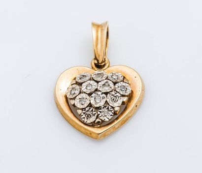 null Pendentif cœur en or jaune et or gris 18 carats (750 millièmes) serti de diamants...