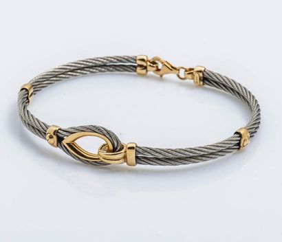 null Bracelet articulé en or jaune 18 carats (750 millièmes) et câble d’acier torsadé...