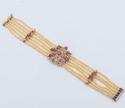 null Bracelet en or rose 14 carats (585 millièmes) composé de six rangs de perles...
