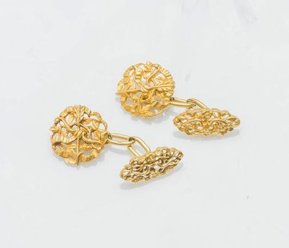 null Paire de boutons de manchettes en or jaune 18 carats (750 millièmes) à motifs...