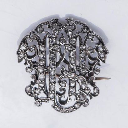 null Broche en or jaune 18 carats (750 millièmes) et argent (925 millièmes) ornée...