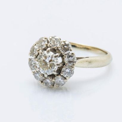 null Bague fleur en or gris 18 carats (750 millièmes) sertie d’un diamant taillé...