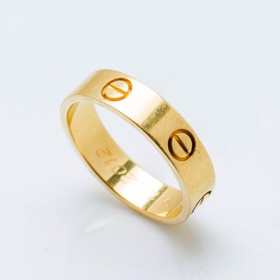 CARTIER Alliance «Love» en or jaune 18 carats (750 millièmes) à décor gravé de vis....