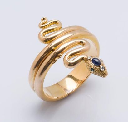 null Bracelet rigide ouvrant formant un serpent en or jaune 18 carats (750 millièmes),...