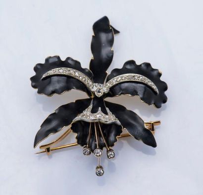 null Broche orchidée en or jaune 18 carats (750 millièmes) et 9 carats (375 millièmes)...