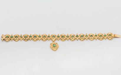 null Bracelet articulé en or jaune 18 carats (750 millièmes), les maillons ciselés...