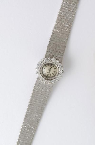 OMEGA Montre bracelet de dame en or gris 18 carats (750 millièmes), boîtier rond,...