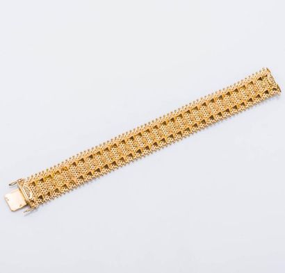 null Bracelet ruban souple en or jaune 18 carats (750 millièmes) à décor de pastilles...