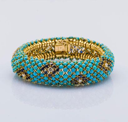 KUTCHINSKI Bracelet articulé et bombé en or jaune 18 carats (750 millièmes) entièrement...