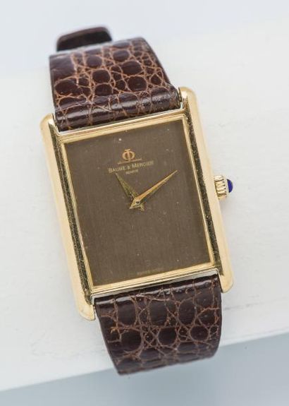 BAUME & MERCIER (HOMME / OR JAUNE - TABAC), vers 1990

Montre d’homme rectangulaire...