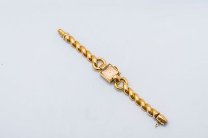 Bracelet montre de dame en or jaune 18 carats...