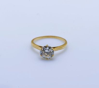 null Bague solitaire en or jaune 18 carats (750 millièmes) sertie d’un diamant taillé...
