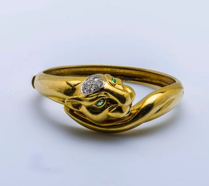 null Bracelet jonc ouvrant en or jaune 18 carats (750 millièmes) orné d’un mufle...