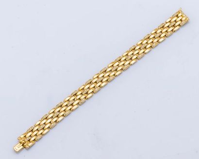 CARTIER Bracelet ruban à maillons panthère en or jaune 18 carats (750 millièmes)...