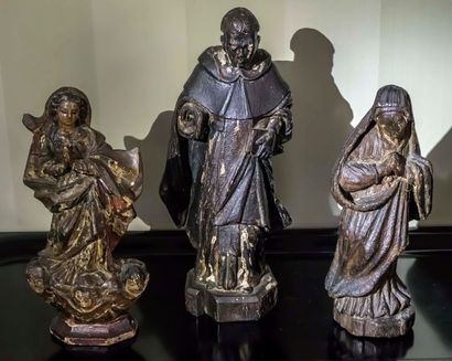 null Réunion de trois statuettes religieuses représentant : 

- la Vierge de l'assomption...