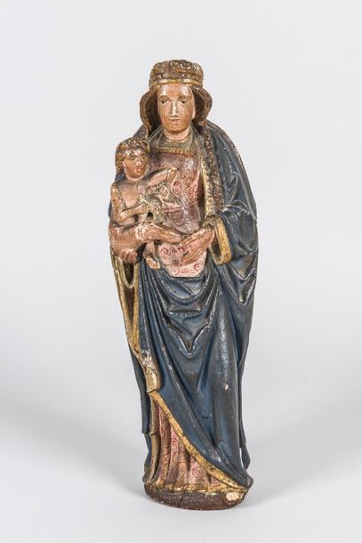null Vierge à l'enfant en bois sculpté polychrome

XVIIème siècle

H : 45 cm