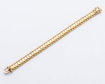 null Bracelet en or jaune 18 carats (750 millièmes) à maille articulée.

Longueur...