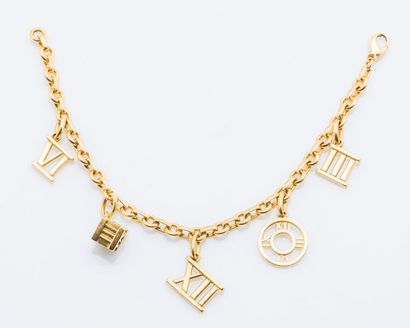 TIFFANY & CO Bracelet charm’s en or jaune 18 carats (750 millièmes), les charm’s...