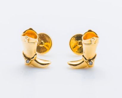 TIFFANY & CO Paire de boutons de manchettes botte en or jaune 18 carats (750 millièmes)...