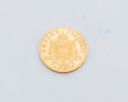 null Une pièce de 20 francs or Napoléon III, tête laurée, 1862.

Poids : 6,4 g