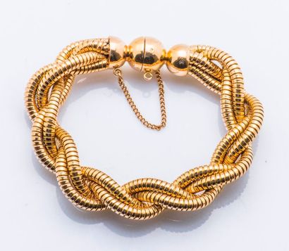 null Bracelet souple en or jaune 18 carats (750 millièmes) formé de quatre rangs...