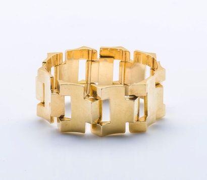 null Bracelet tank en or jaune 18 carats (750 millièmes) articulé à maillons géométriques...