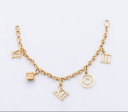 TIFFANY & CO Bracelet charm’s «Atlas» en or jaune 18 carats (750 millièmes), les...
