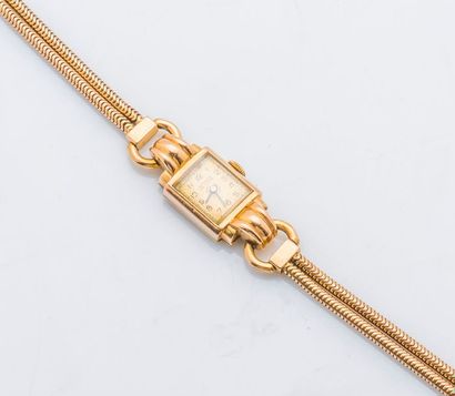 LONGINES Vers 1950 Bracelet montre de dame en or jaune 18 carats (750 millièmes),...