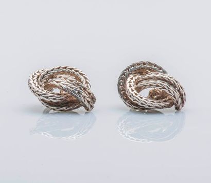 HERMÈS Paire de clips d’oreilles nœud en argent (925 millièmes) formant une double...