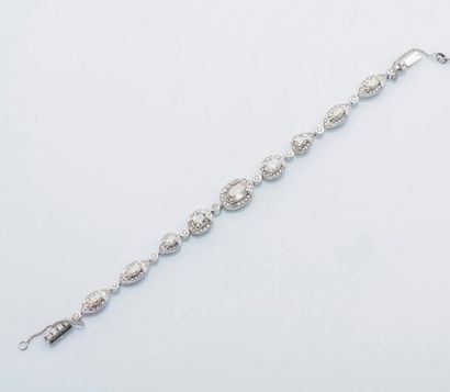 null Bracelet en or gris 14 carats (585 millièmes) serti de diamants ovales, navette...