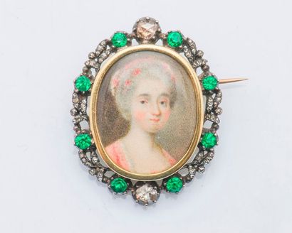 null Broche en or jaune 18 carats (750 millièmes) et argent (925 millièmes) ornée...