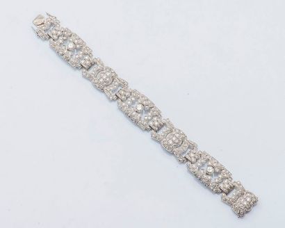 null Bracelet ruban articulé en platine (950 millièmes), les maillons géométriques...
