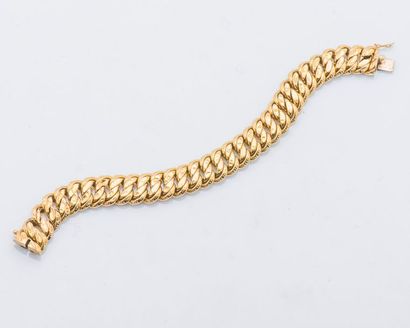 null Bracelet gourmette en or jaune 18 carats (750 millièmes) à maille américaine...
