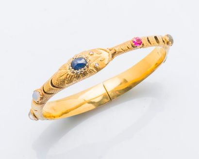 null Bracelet serpent formant un jonc ouvrant en or jaune 14 carats (585 millièmes)...