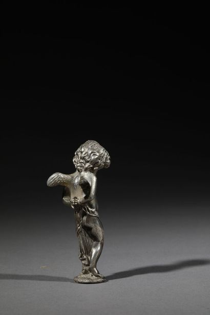 null Silver seal showing a cherub.
Weight: 155g
Height: 8.5 cm