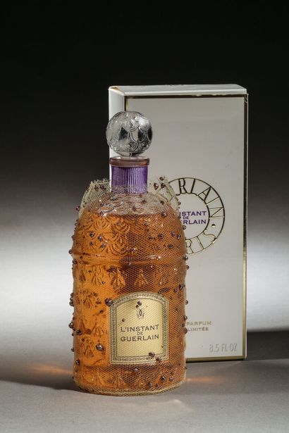 null Guerlain - "L'Instant" (2003) 
Bottle model "Abeilles Blanches" dressed with...