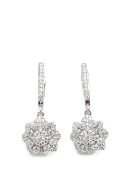 Lovely pair of white gold earrings stylizing...