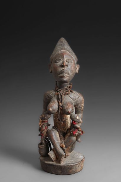 null VILI, République Démocratique du Congo
Statuette en bois figurant une maternité.
Traces...