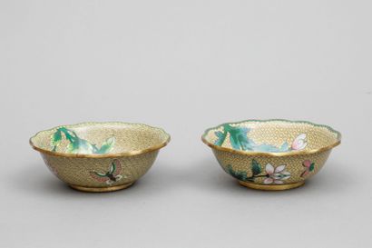 null Pair of poly-lobed cups in copper and polychrome cloisonné enamels on a yellow...